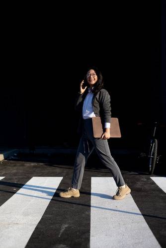 Accountant crossing the road